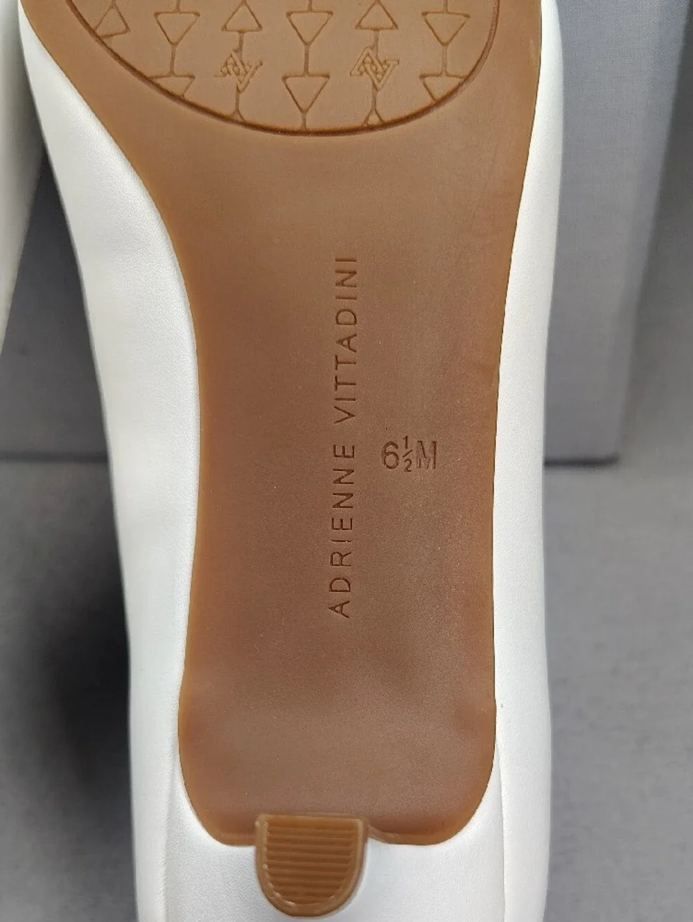 Adrienne Vittadini White Kitten Heels Rose Gold Accents Holding Gold Chain